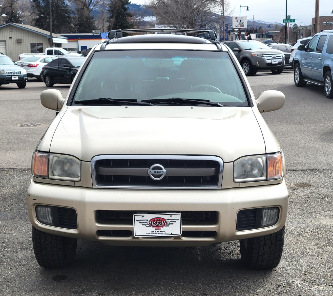 2002 Gold /Tan Nissan Pathfinder LE (JN8DR09Y22W) with an 3.5L v6 engine, Automatic transmission, located at 450 N Russell, Missoula, MT, 59801, (406) 543-6600, 46.874496, -114.017433 - 4WD SUV. 3.5L V6. Automatic Transmission. Heated Seats. Power Leather Seats. Power Sunroof. Air. Cruise. Tilt. AM FM CD Player. Power Windows and Locks. Because of the age, Financing is not available on this vehicle. - Photo #2